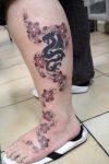 cherry blossom flower with dragon tattoo
